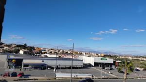 a view of a parking lot with a building at Apartamento Pepe in Alcantarilla