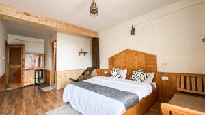Voodi või voodid majutusasutuse Bayith Cafe and Stay toas
