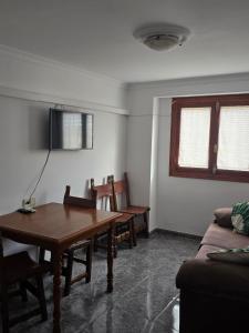 Μια τηλεόραση ή/και κέντρο ψυχαγωγίας στο Apartamento Orán 3