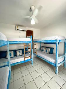 Katil atau katil-katil dalam bilik di Vila Mucugê Pousada e Hostel +89 gambar
