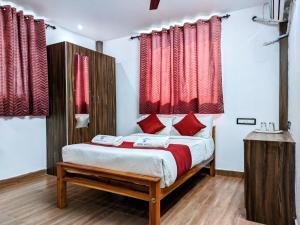 Postel nebo postele na pokoji v ubytování Skyry Hotels Singanallur