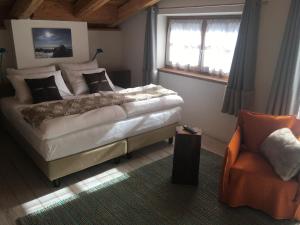 Un pat sau paturi într-o cameră la 4478 Mountain Lodge