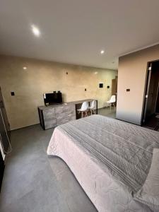 Ένα ή περισσότερα κρεβάτια σε δωμάτιο στο DPTO 205 Edif Loftier