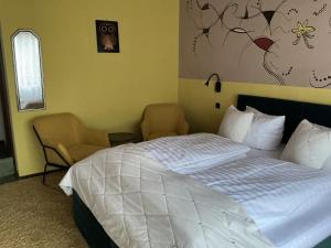 Postel nebo postele na pokoji v ubytování Hotel Eulenhof