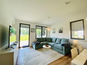 Χώρος καθιστικού στο Ferienwohnung Inselglück Parkvillen Carlota und Candela Baabe