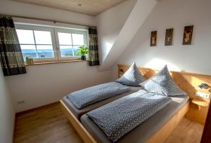 Postel nebo postele na pokoji v ubytování Ferienhaus Benedikt