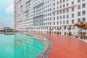 Πισίνα στο ή κοντά στο Apartemen Patraland Urbano By Public Room