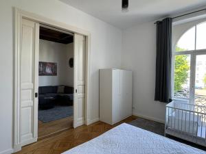 Un pat sau paturi într-o cameră la Nordsee Apartments