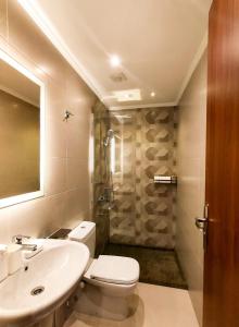 Koupelna v ubytování Sama hotel