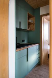 Kuchyň nebo kuchyňský kout v ubytování Das Nordberg Guesthouse