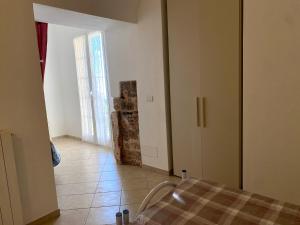 Ένα ή περισσότερα κρεβάτια σε δωμάτιο στο Gli ulivi della Monda