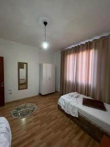 Postel nebo postele na pokoji v ubytování KEDA's-Guesthouse