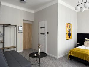 Postel nebo postele na pokoji v ubytování Milla Apartments