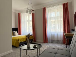 Postel nebo postele na pokoji v ubytování Milla Apartments