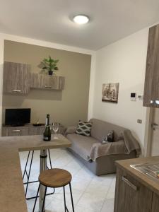 a living room with a couch and a table at Zar in Omegna
