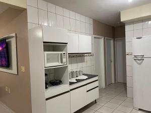 Η κουζίνα ή μικρή κουζίνα στο CASA com 3 QUARTOS 1000M DA PRAIA +5 φωτογραφίες
