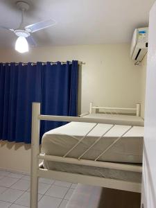 Ένα ή περισσότερα κρεβάτια σε δωμάτιο στο CASA com 3 QUARTOS 1000M DA PRAIA