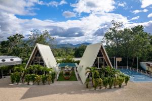 a resort with a pool and a tennis court at Blue Ridge Retreat in Potrero