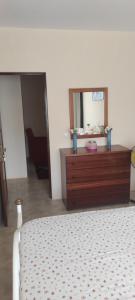 Letto o letti in una camera di guesthouse emaly