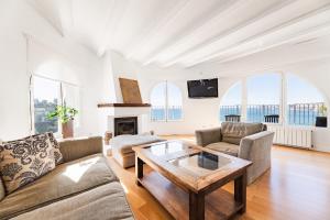 TV a/nebo společenská místnost v ubytování Terraza al Mar