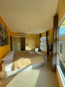 Ένα ή περισσότερα κρεβάτια σε δωμάτιο στο Aubon Hostel