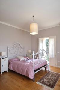 Posteľ alebo postele v izbe v ubytovaní B&B Orsobigio