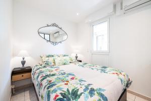 Postel nebo postele na pokoji v ubytování ST LAURENT - Appartement au calme avec terrasse & parking