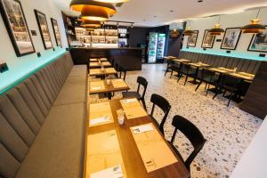 Reštaurácia alebo iné gastronomické zariadenie v ubytovaní City Premium Rooms Old town