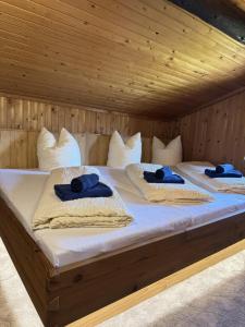 Posteľ alebo postele v izbe v ubytovaní Sepplhütte