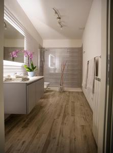 a bathroom with a sink and a counter top at appartamento l'olivo in San Gimignano