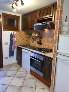 Photo de la galerie de l'établissement Appartamento I Geranei 3, à San Teodoro