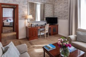 TV o dispositivi per l'intrattenimento presso Starhotels Terminus