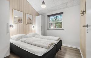 Postel nebo postele na pokoji v ubytování Holiday Home Solsiden Blåvand X