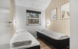 Postel nebo postele na pokoji v ubytování Holiday Home Solsiden Blåvand X
