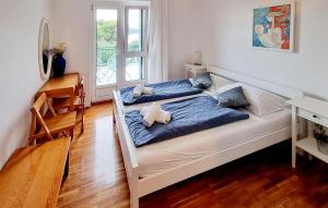 Ένα ή περισσότερα κρεβάτια σε δωμάτιο στο Pet Friendly Apartment In Pirovac