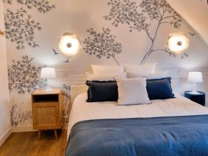 Postel nebo postele na pokoji v ubytování CAP MARIN DE LANCIEUX charmante et spacieuce à 50 m de la plage