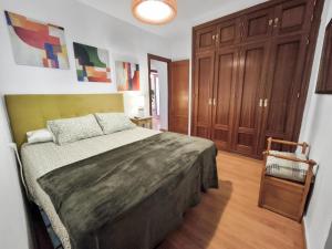 Łóżko lub łóżka w pokoju w obiekcie Apartamento Medina