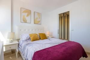 Posteľ alebo postele v izbe v ubytovaní Apartamento Perla