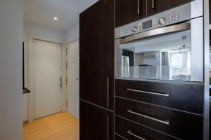 Kuchyňa alebo kuchynka v ubytovaní Apartamento Perla