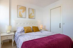 Posteľ alebo postele v izbe v ubytovaní Apartamento Perla