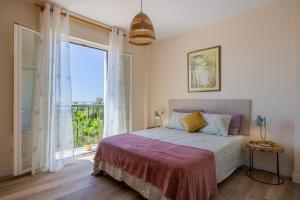 Posteľ alebo postele v izbe v ubytovaní Balcones de Benalmadena
