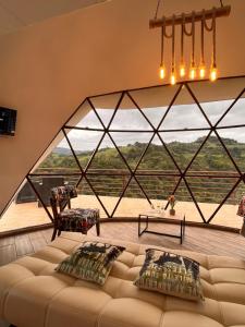 Posezení v ubytování Koumpí Glamping Lodge