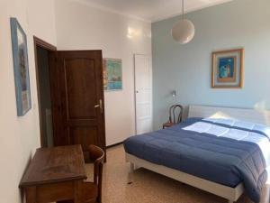 Ένα ή περισσότερα κρεβάτια σε δωμάτιο στο Casa Flora