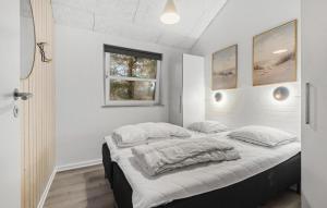 Postel nebo postele na pokoji v ubytování Holiday Home Solsiden Blåvand X