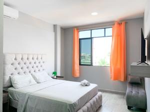 Katil atau katil-katil dalam bilik di Departamento con balcón privado