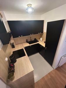 an overhead view of a room with a desk at Apartman Pinea in Samobor