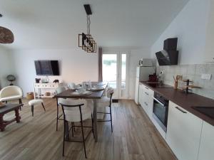 Kuchyň nebo kuchyňský kout v ubytování Maisonnette 55m2 Lozari