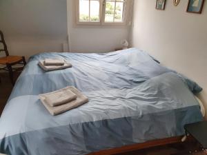 Ένα ή περισσότερα κρεβάτια σε δωμάτιο στο Villa sur la plage Deauville +2 φωτογραφίες