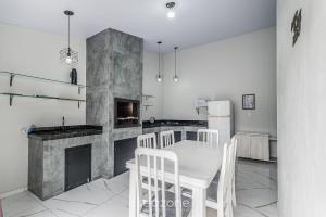 Køkken eller tekøkken på RUC - Casas a 270m da Praia do Canto Grande