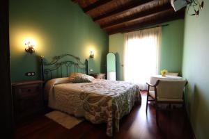 Llit o llits en una habitació de El Rincon Del Villar